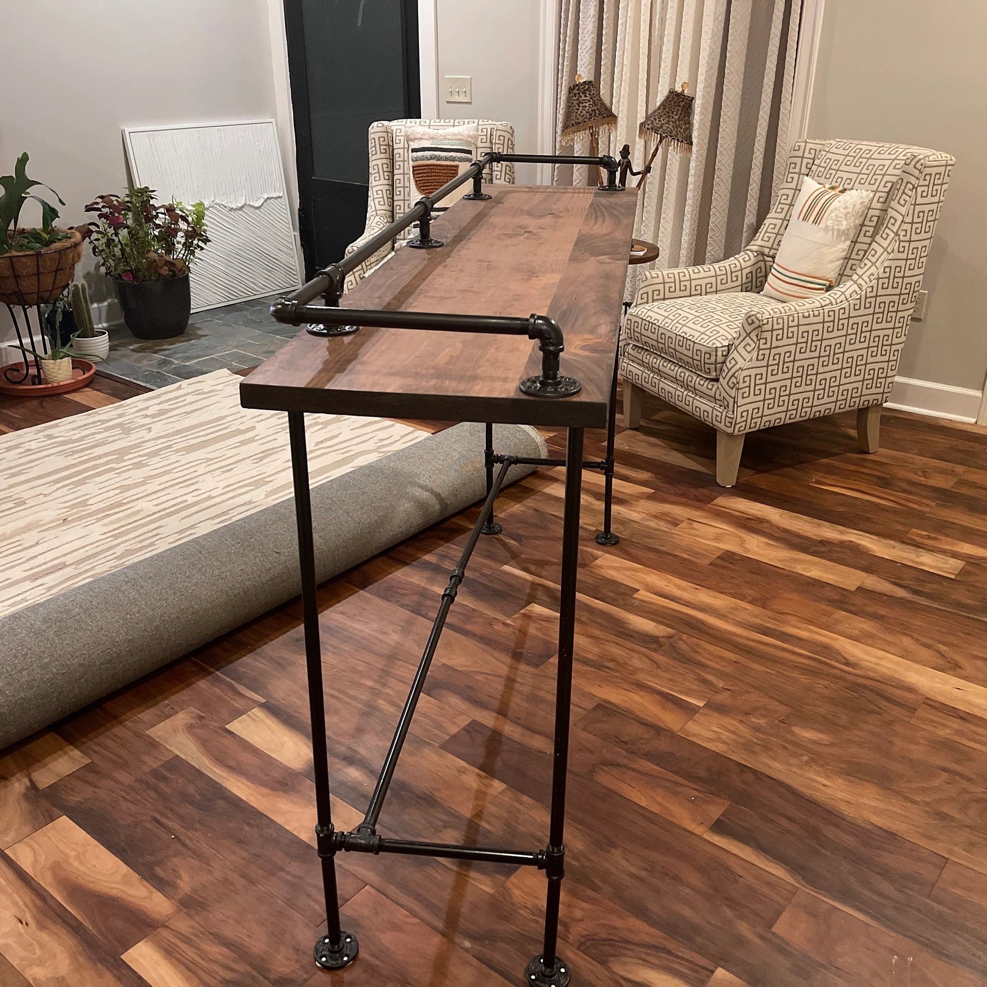 industrial bar table living room with wood tabletop and iron pipe frame